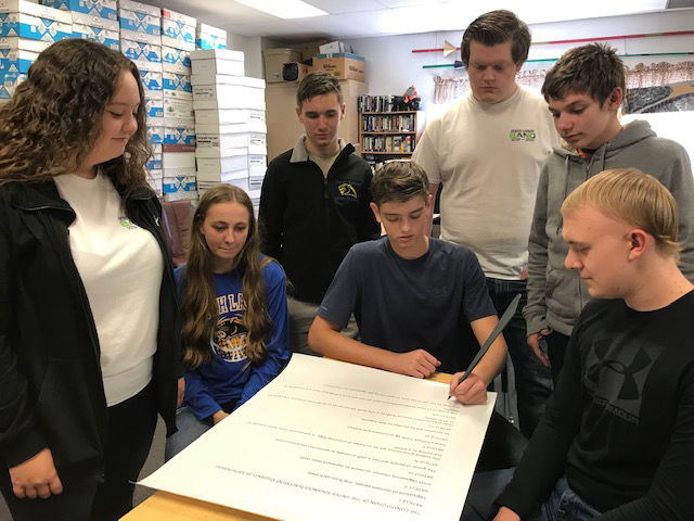 North Lamar sudents write and sign Constitution